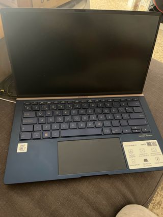 Portátil Asus Azul Dorado no enciende escucho ofer