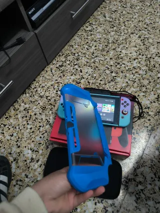 Nintendo Switch con caja y accesorios