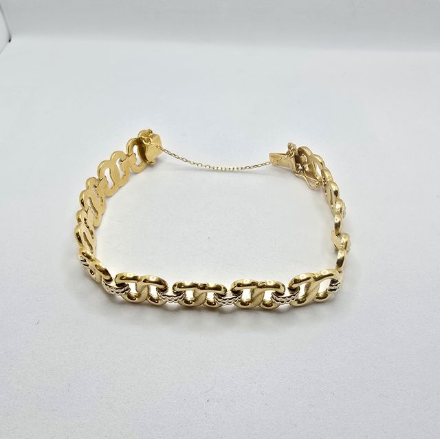 Pulsera de oro de 18k. Peso: 25.14 g.