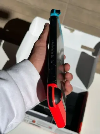 IMPECABLE Nintendo Switch V2 con caja