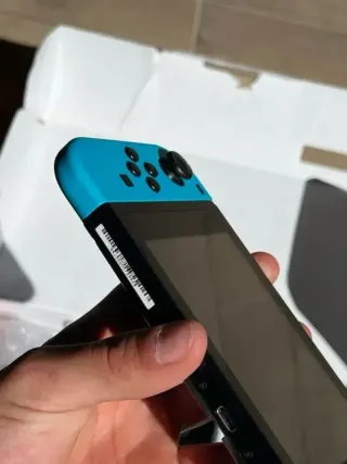 IMPECABLE Nintendo Switch V2 con caja