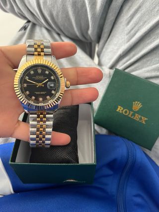 Reloj Plateado y Dorado