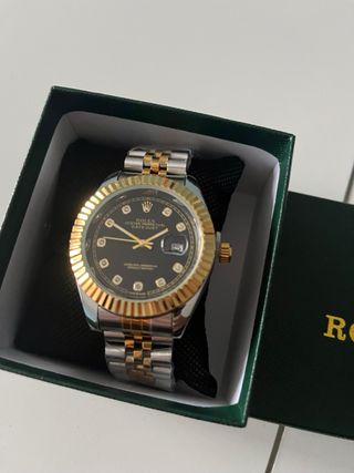 Reloj Plateado y Dorado