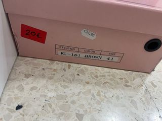 Botas altas marrones con flecos