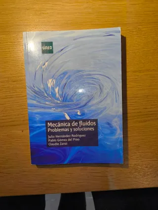 Mecánica de fluidos. Problemas y soluciones. UNED.