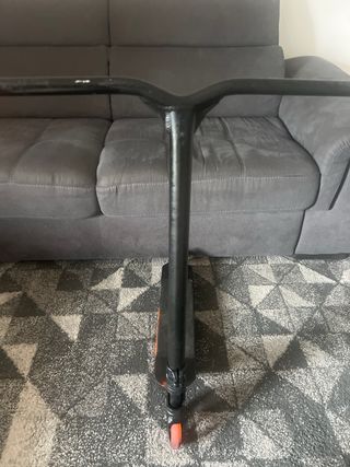 Patinete freestyle negro y naranja