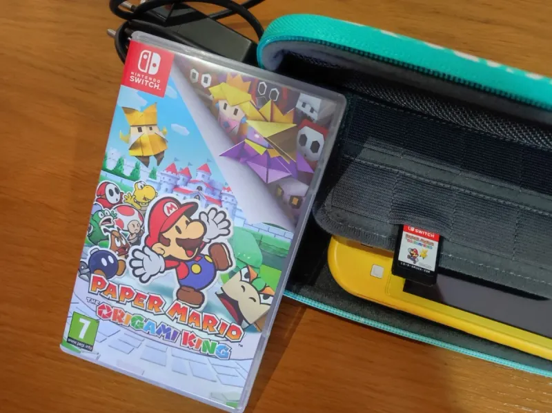 Nintendo Switch Lite Amarilla + Funda afbeelding 6