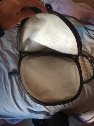 Raqueta de tenis con funda