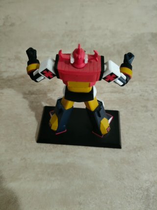 Statuetta Daltanious