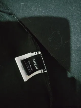 Chaleco negro efecto piel