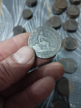 180 monedas 10 céntimos 1870 + 70 monedas 5 céntim