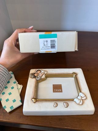 Cornice Thun con angioletti e fiocco