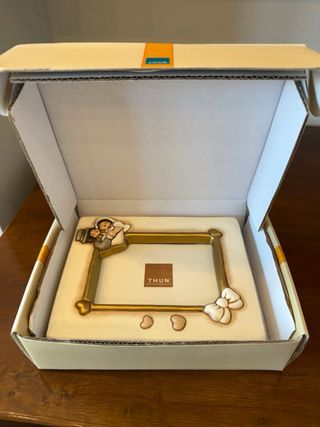 Cornice Thun con angioletti e fiocco