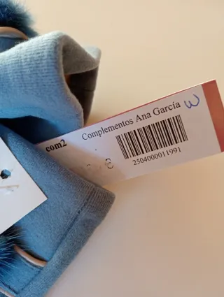 Guantes de mujer azul con pompón