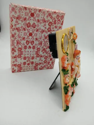 Cornice portafoto con orologio