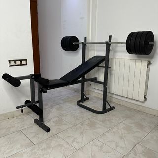 Banco de pesas Gyronetics con barra