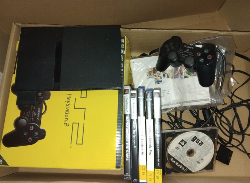 Consola Playstation 2 Slim y juegos en lote