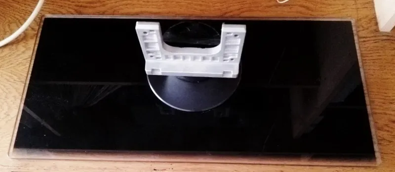 Pie de cristal giratorio de televisor LG