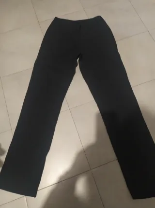 Jeans donna moschino con cuore alla caviglia .