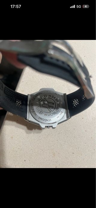 Reloj de chico plateado y negro