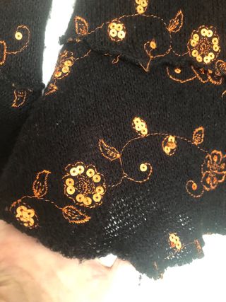 Jersey asimétrico con lentejuelas