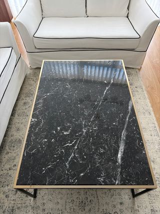 Mesa de centro mármol negro y metal dorado