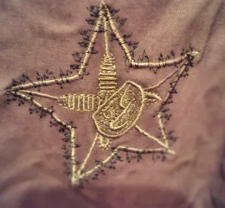 Parka verde militar con parches