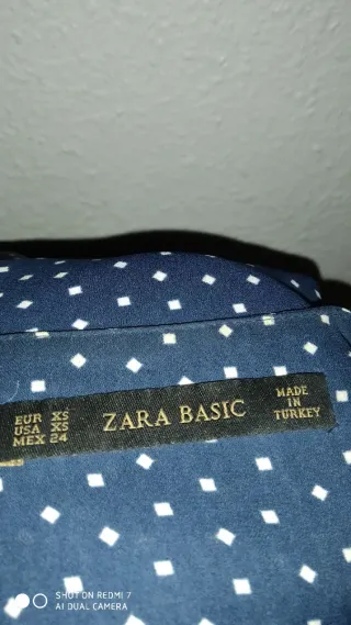 Blusa manga larga lunares