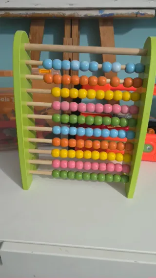 Lote de juguetes: abaco, caja herramientas