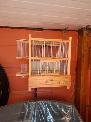 Jaula para jilguero con bebedero