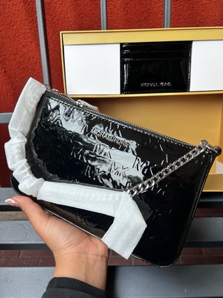 Borsa Michael Kors nera lucida