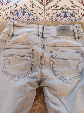 Pantalón vaquero gris mujer de talle bajo.