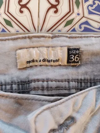 Pantalón vaquero gris mujer de talle bajo.