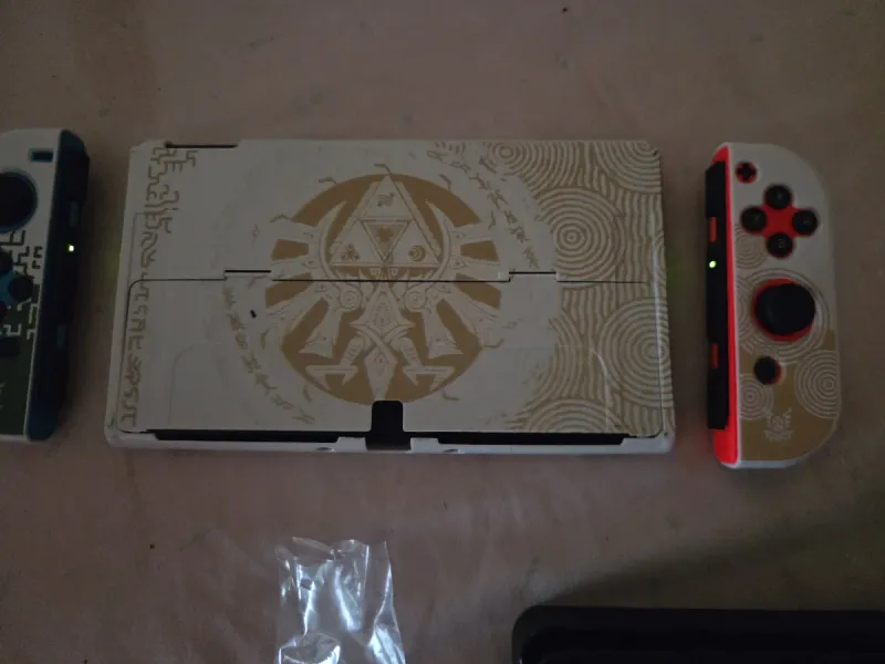 Nintendo Switch OLED Azul y Rojo afbeelding 3