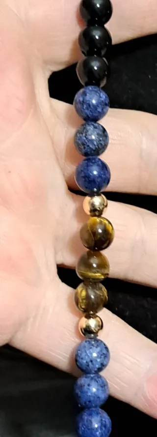 Mala pietre dure nere e blu marroni oro