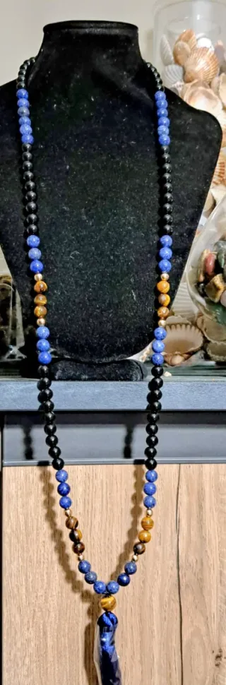 Mala pietre dure nere e blu marroni oro