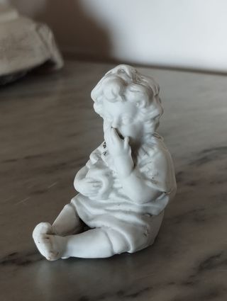 Figuras em Porcelana Biscuit - 2 Meninos Sentados