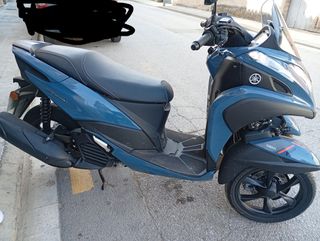 Moto tricity azul seminuevo