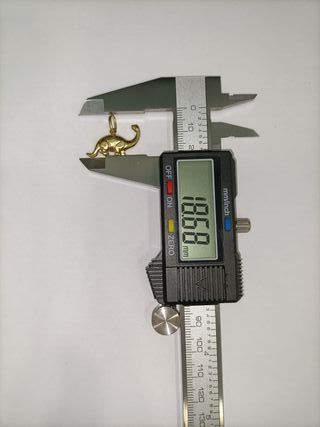 Colgante Oro 18k Dinosaurio 1.40gr