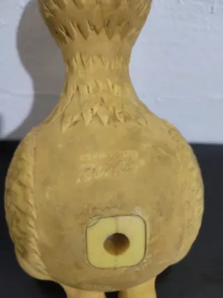 Juguete de goma con forma de pollo