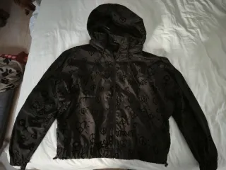 Cortavientos Desigual con capucha y cremallera Neg