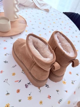 Botas de pelo marrones