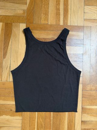 Top negro con estrella brillante