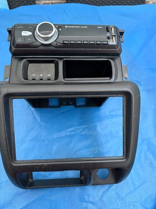 Consola Central Radio Reloj Suzuki Jimny 2002