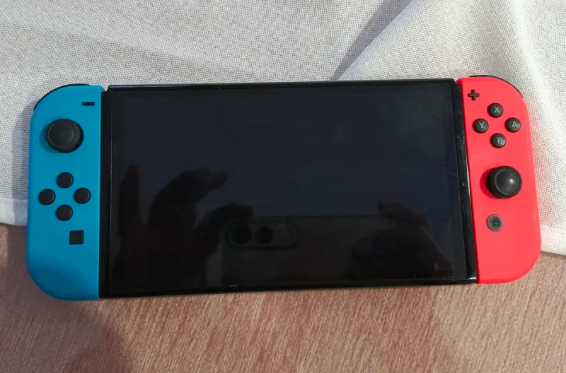 Nintendo Switch OLED Azul y Rojo afbeelding 6