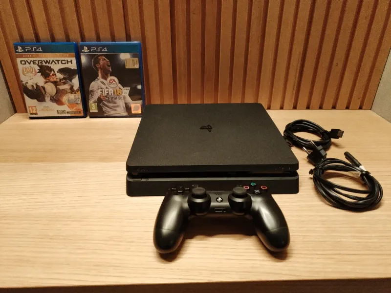 Consola PS4 Slim + mando + 2 juegos