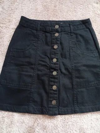 Minifalda negra vaquera Stradivarius mujer