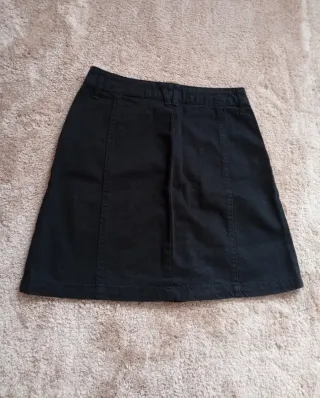 Minifalda negra vaquera Stradivarius mujer