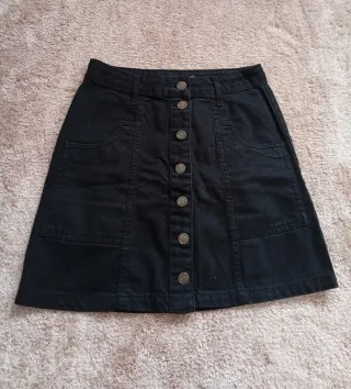 Minifalda negra vaquera Stradivarius mujer