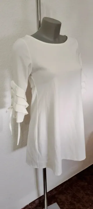 Vestido blanco con volantes